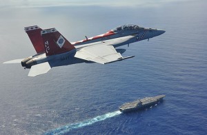 F-A-18F_flies_above_USS_George_Washington_in_Philippine_Sea._(9568001195)