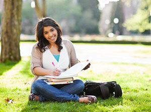 Distance Learning student, studying in a park