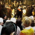 People looking at the painting `The Night Watch'