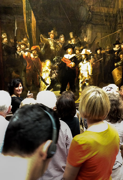 People looking at the painting `The Night Watch'