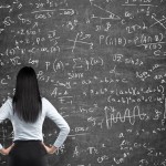 Mathematician in front of blackboard