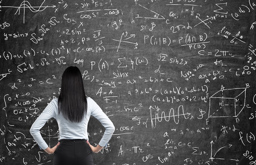Mathematician in front of blackboard